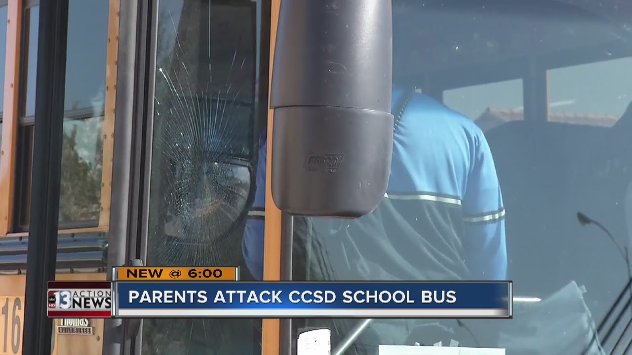 Angry parents punch school bus window
