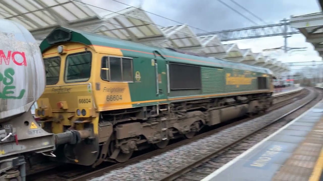 Class 66 shed comes through Kettering with the castle cement wagons , I think freightliner