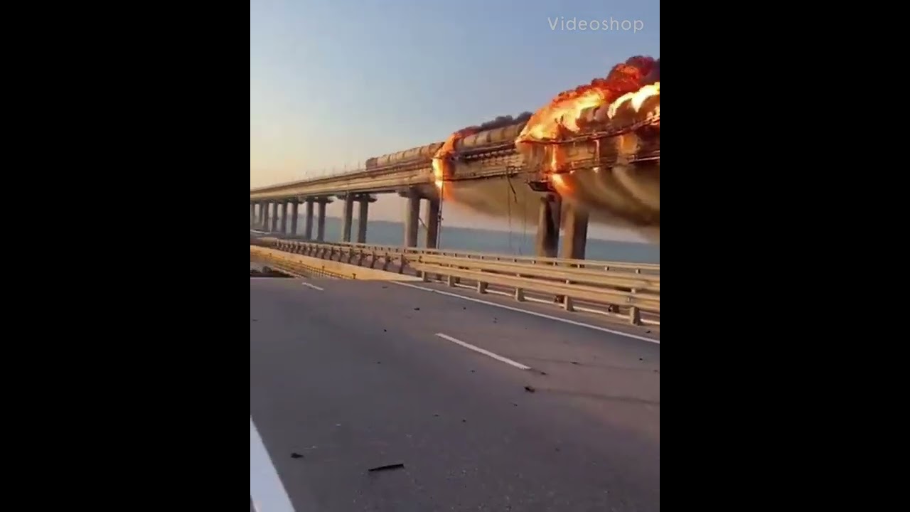 Crimea bridge with burning train after explosion