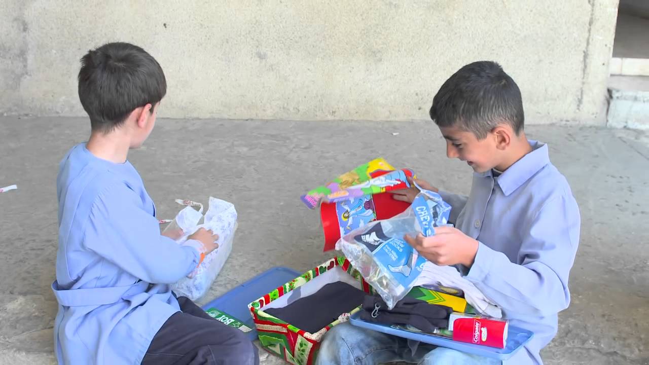 Boys Search Through Their Boxes - Operation Christmas Child