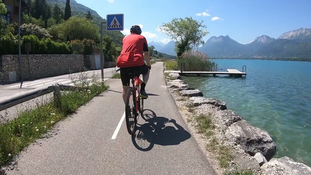 Cycle tour around Lac Annecy, France on voie verte cycle way.