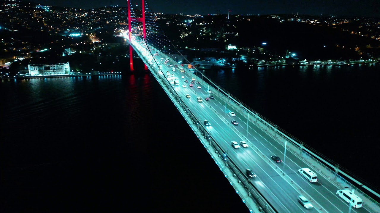 aerial shoot of istanbul bosphorus bridge and ortakoy mosque at night / mavic2pro