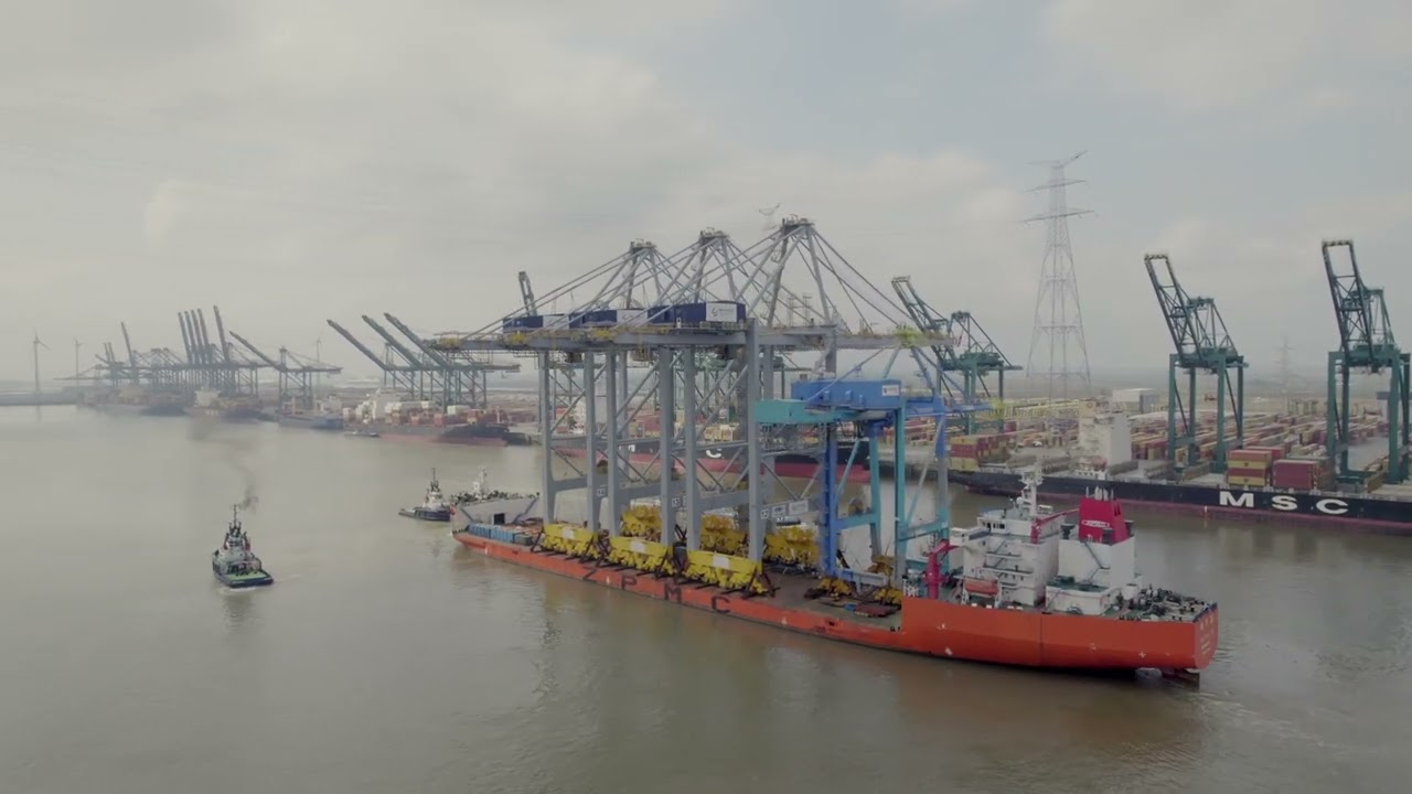 Boluda Towage safely assisted Zhen Hua, loaded with 3 STS Cranes to Antwerp ( Skyvisiondrone.be)