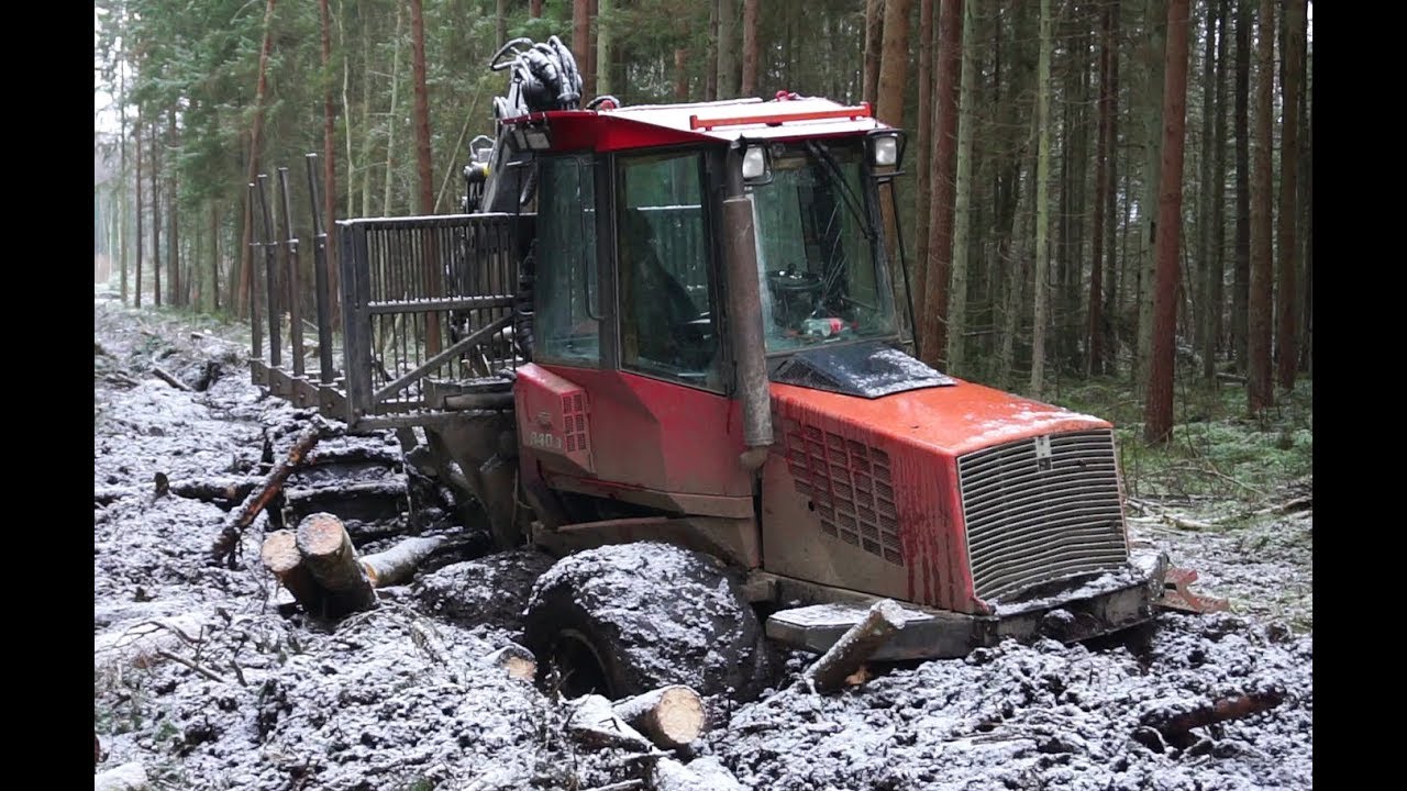 Valmet 840.3 stuck in mud, saving with Logset 6F