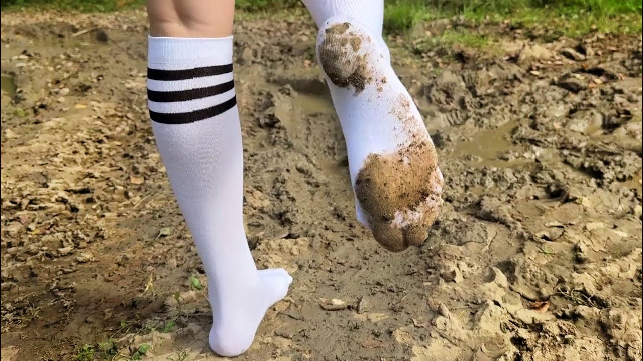 White knee high socks in mud, black stockings in mud, muddy feet, girl in stockings in mud ( # 1610)