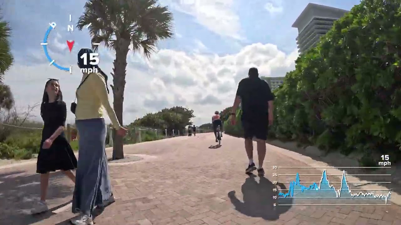 Riding bike - Sidewalk Miami Beach 