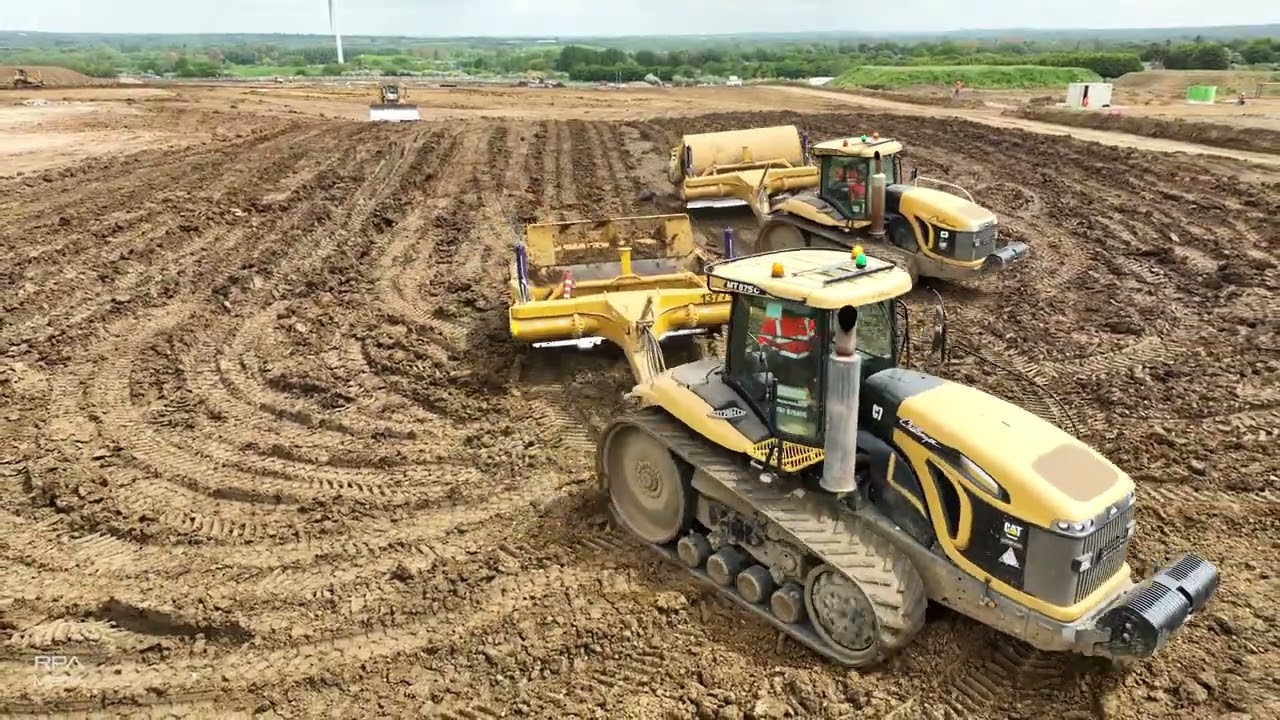 AGCO Challenger tractors pulling K-Tec pans. #scrapers #tractor
