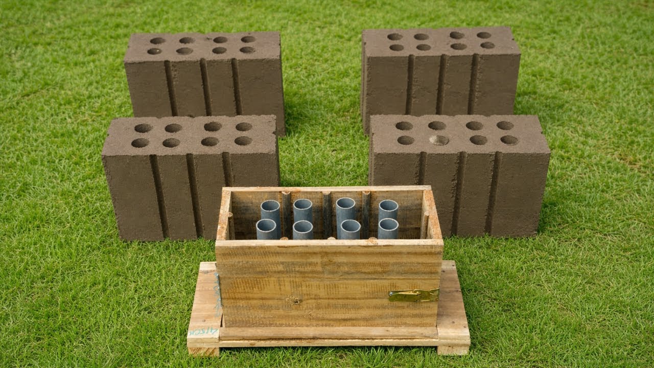 Creating cement brick molds from wooden molds and cement.