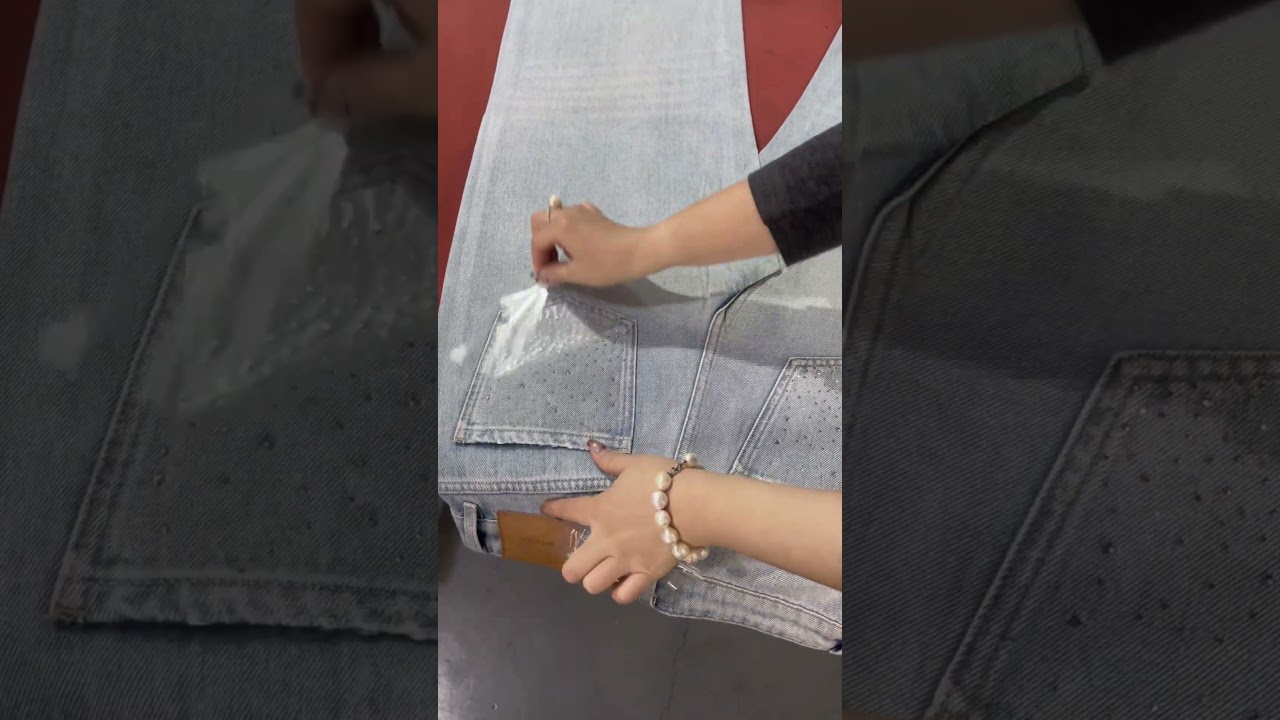 Heat press machine for applying rhinestones to denim jeans pockets. #heatpress #tshirtdesign
