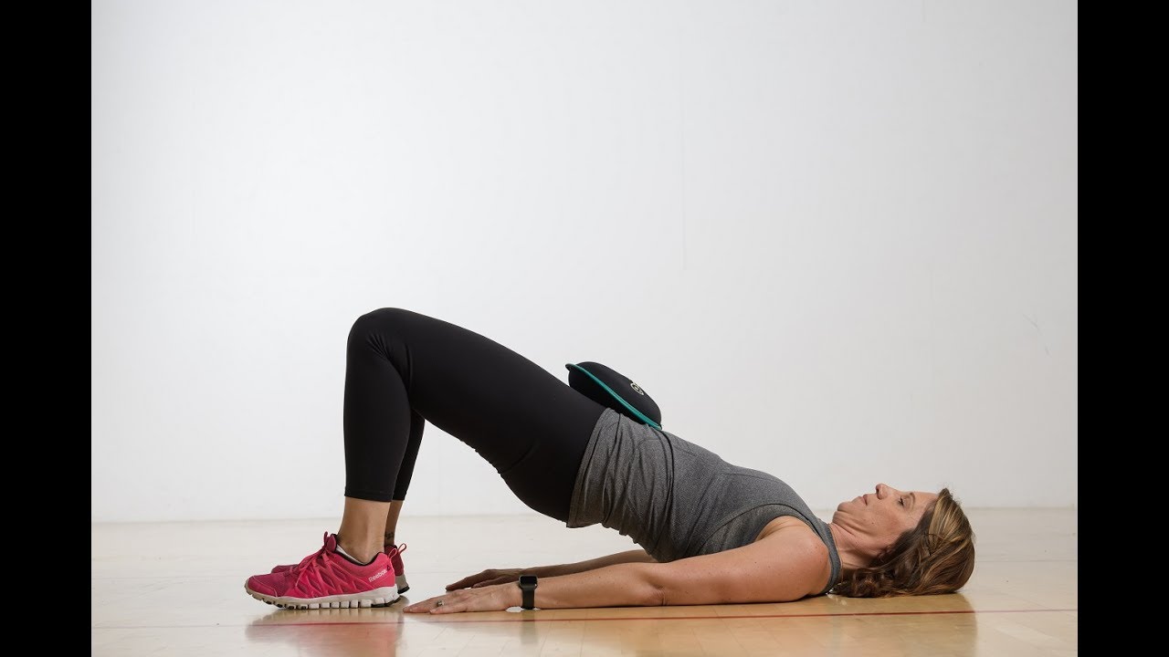 Weighted Bridge &bull; Summer SandBell Strength Circuit | 24 Hour Fitness