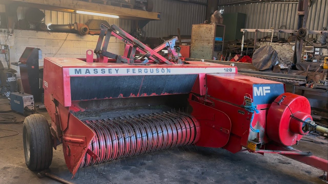 Repairs on Massey Ferguson 128 baler