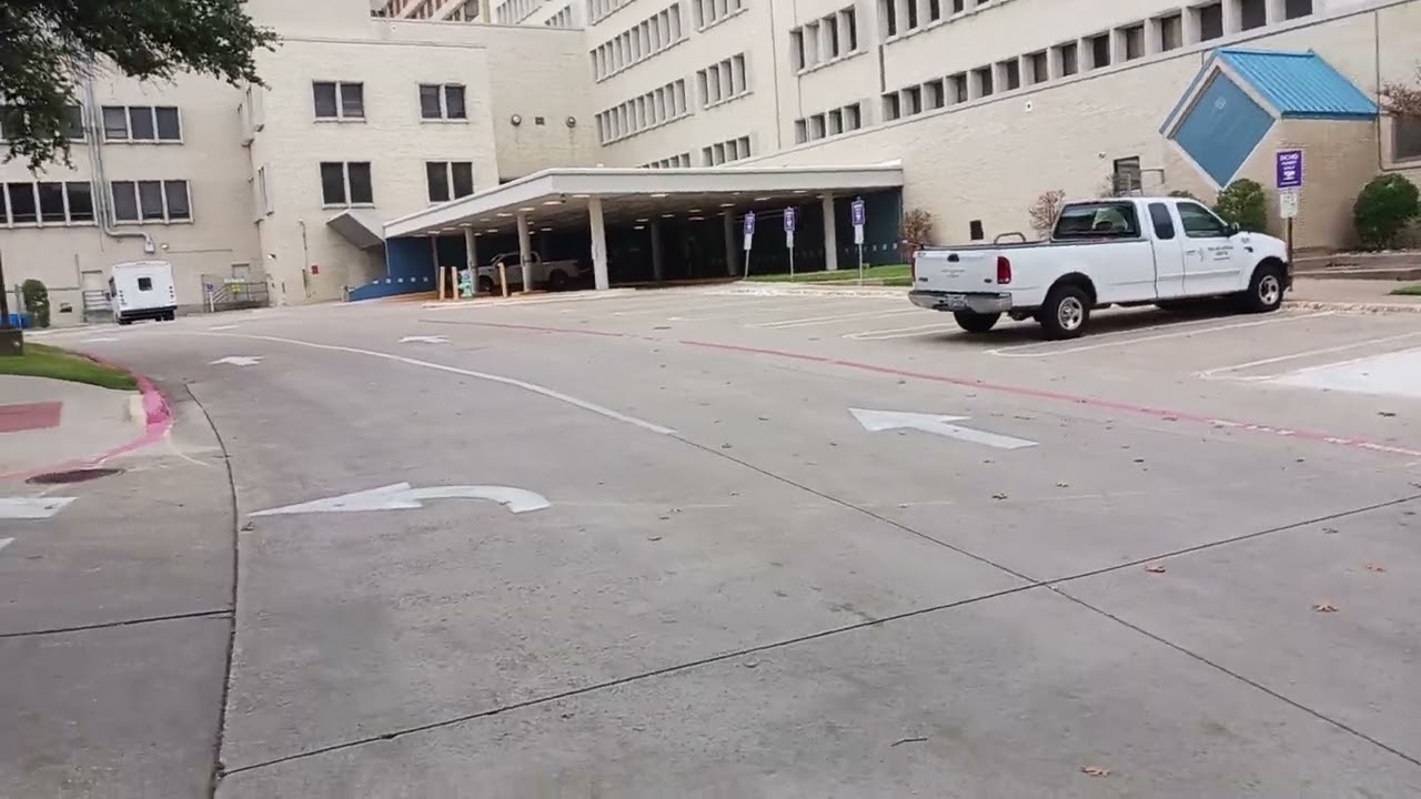 Walking by the old Parkland Memorial Hospital Emergency Room where JFK was brought.