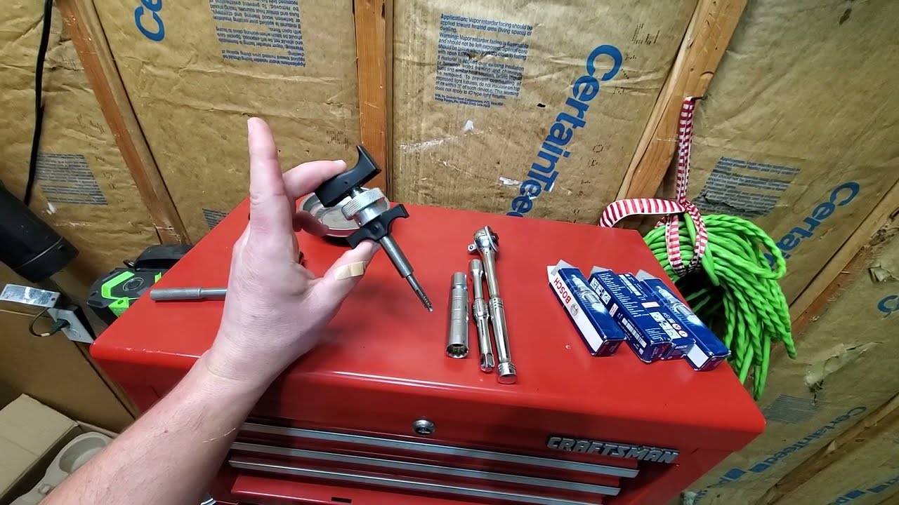 Installing new spark plugs in Volkswagen Atlas Cross Sport