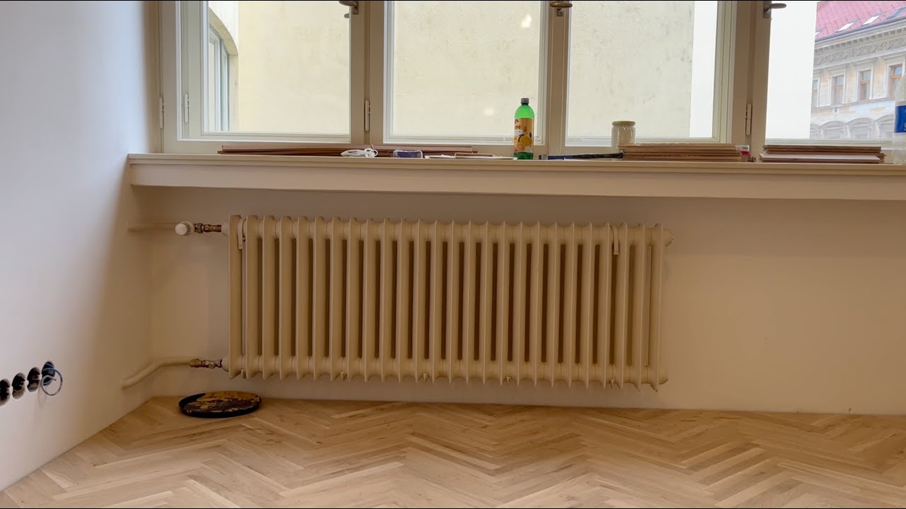 Rekonstrukce funkcionalistického bytu - 17. týden (parkety, topení, obklady)