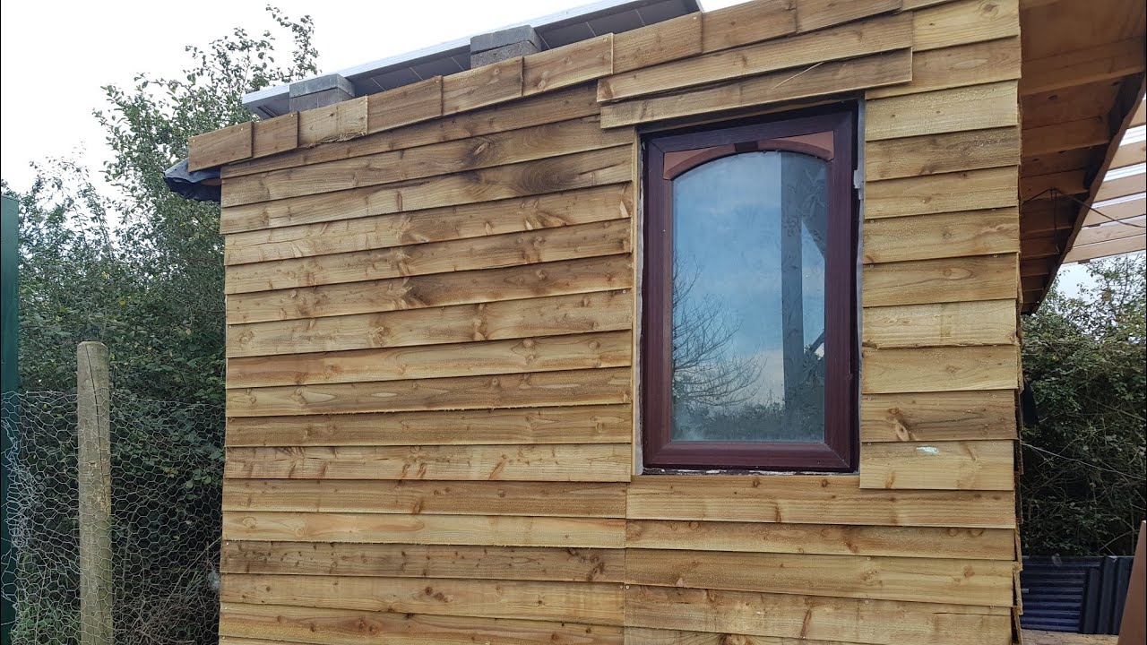Cladding the pallet sheds. (DIY, pallet shed, man cave, shed)