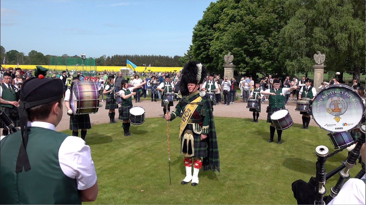 Huntly & District Pipe Band march on to start displays during 2022 Gordon Castle Highland Games