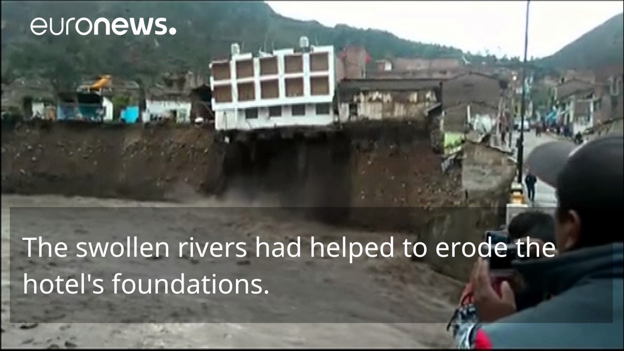 Dramatic footage as hotel collapses into river