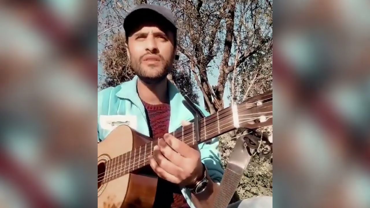 Magnifique Chanson De Lounis AIT MENGUELLET Par Le Jeune Talent Mhenna MEGUENI