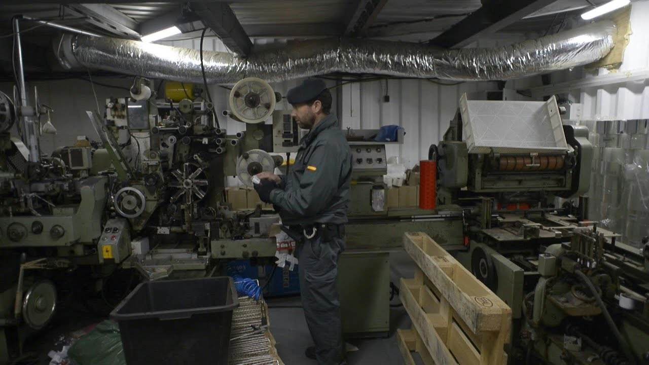 Spanish police uncover underground counterfeit cigarette factory | AFP