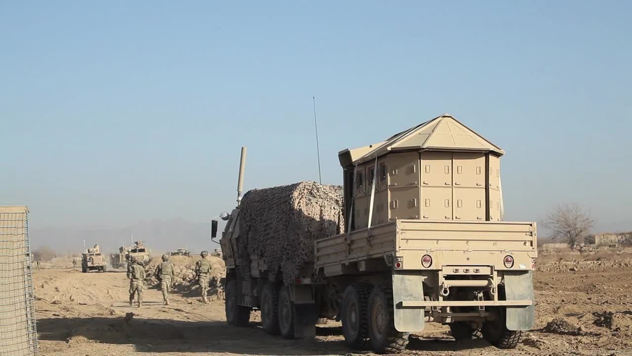 Soldiers Set Up Hesco Bastion And Razor Wire During Strongpoint Construction