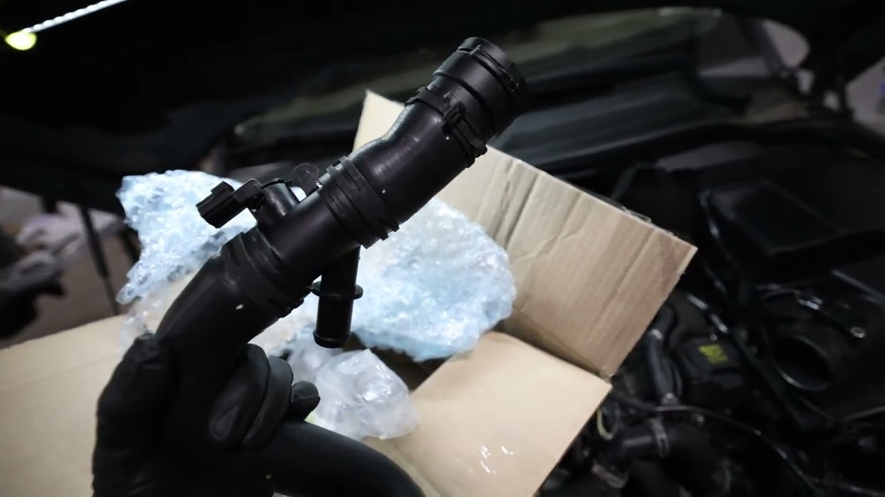 Land Rover LR4 Cooling System Repair; Thermostat, Lower Radiator Hose, and Engine Oil Cooler Gasket