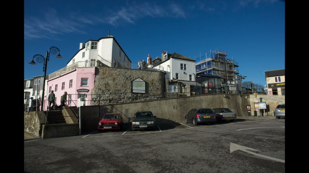 Port folio of Lyme Regis  Jurassic Coast from 1974 to 2025