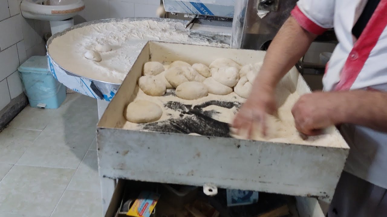 Fresh Tufton Bread baking in Iran shahrekord پختن تافتون تازه خوشمزه ایران شهرکرد