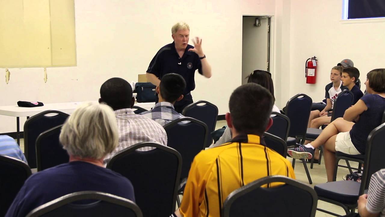 Ben Glass speaking to young soccer referees; how to develop the mindset to enjoy refereeing