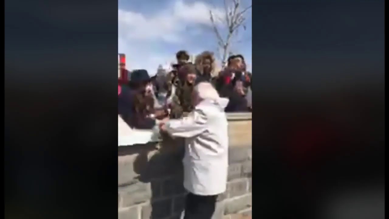 Thousands Chant Bernie Sanders' name as he walks through the crowd on National Walkout Day
