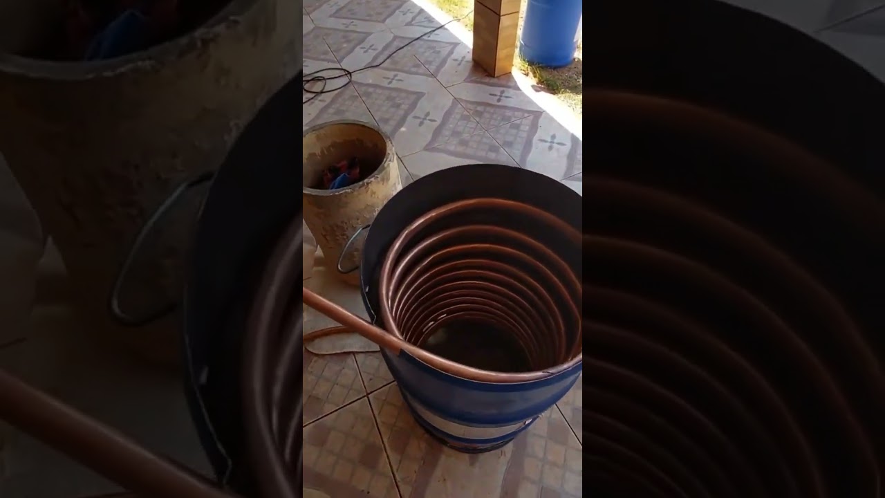 Aquecimento de água com serpentina de cobre e lenha