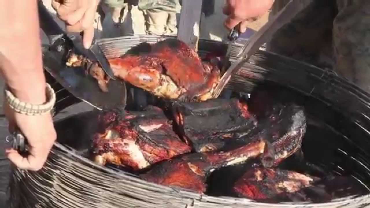 US Marines cook a meal of Lamb in Sangin Afghanistan 2010