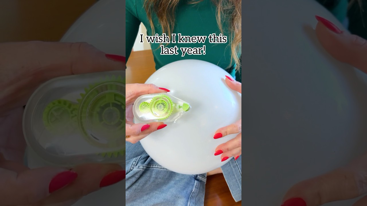 Use double sided tape to make balloons stick to the ceiling! #balloons #party #newyear