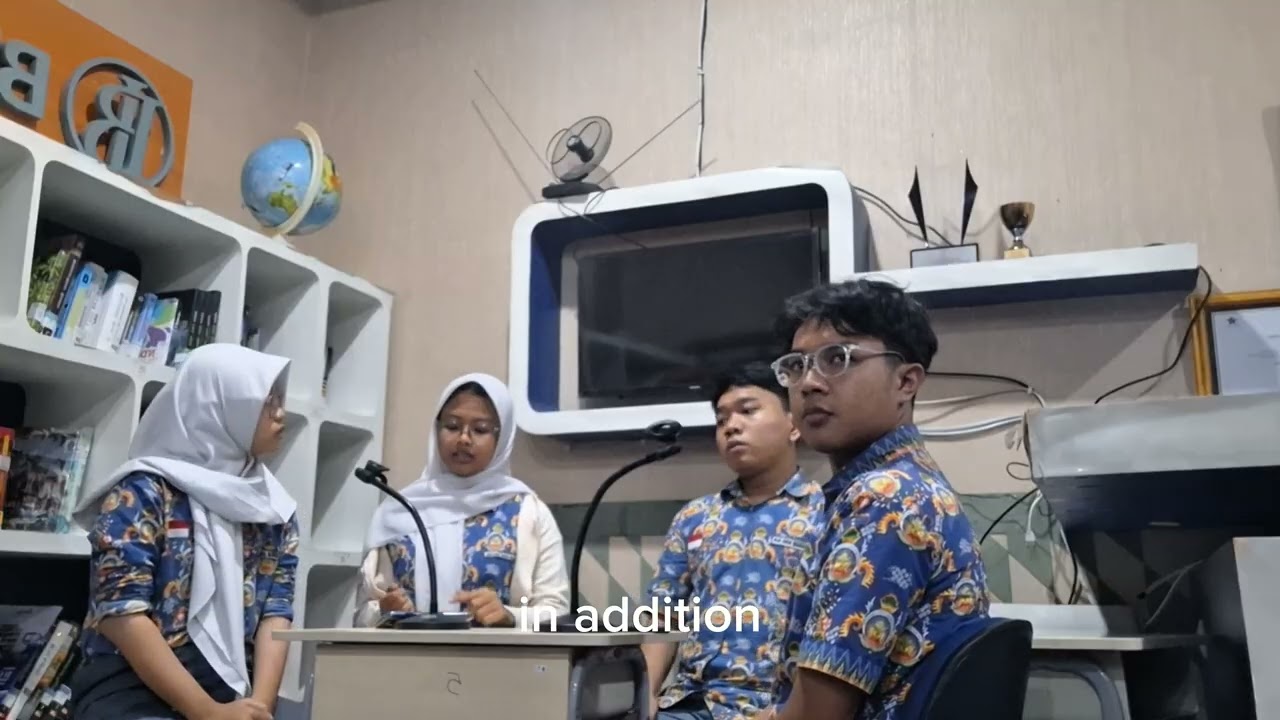 QRIS in Digital Era - B.Ing Uprak XII-C by Group Chicken