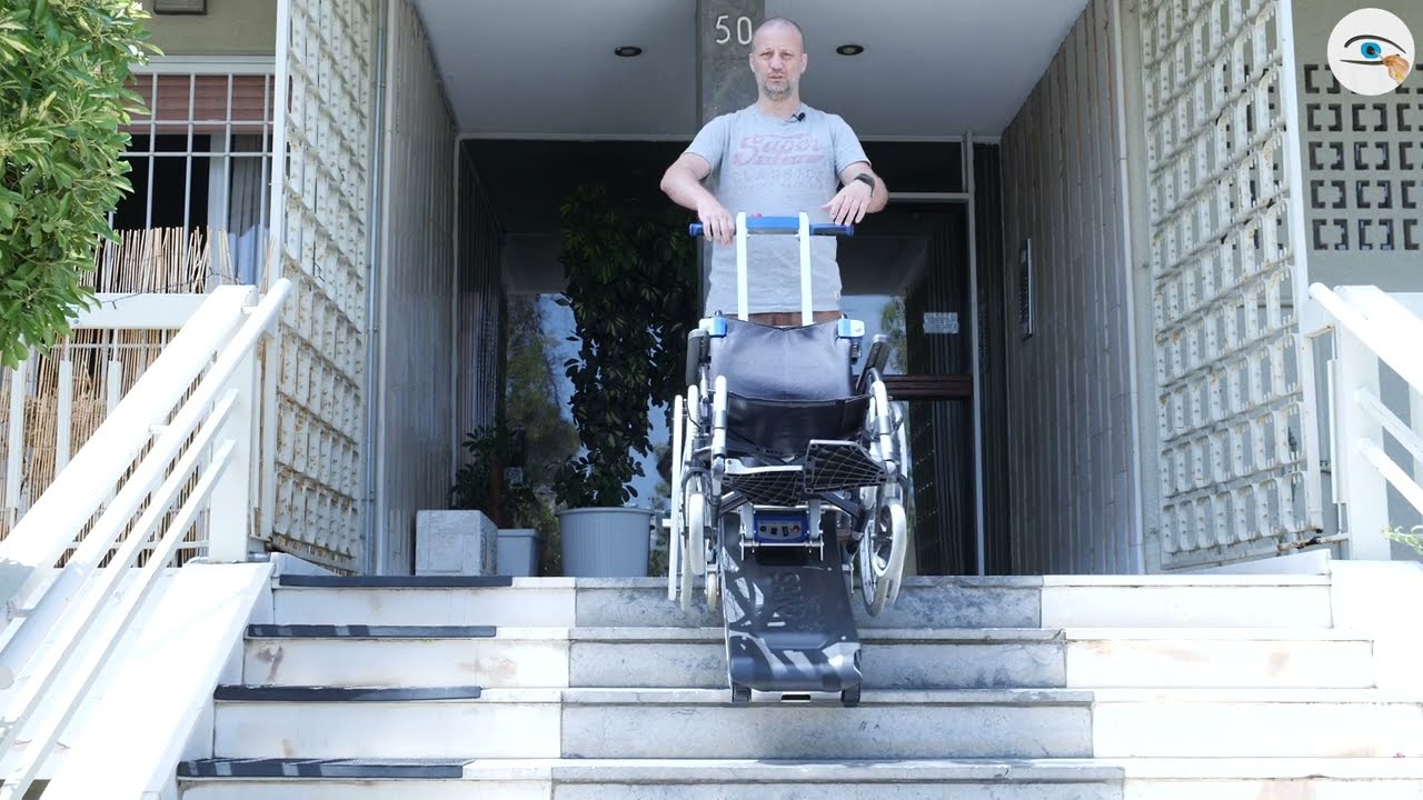 Ανάβαση σκαλιών με αναπηρικό αμαξίδιο