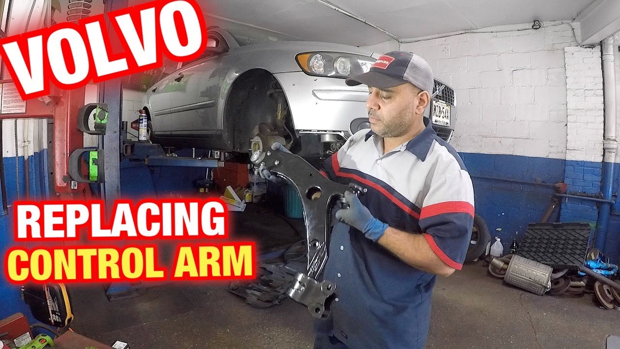 How to replace lower control arm on Volvo v50  ||   Control arm replacement