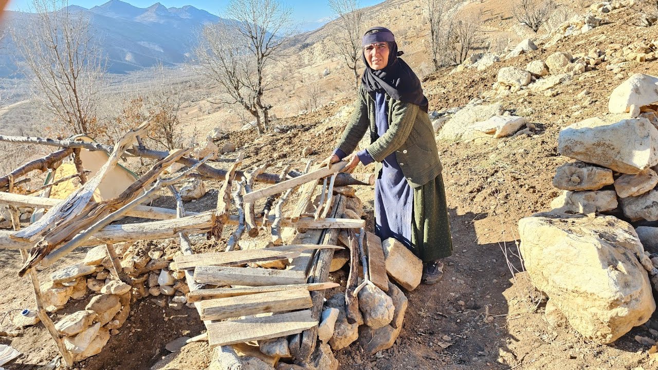 A lonely grandmother in the mountains built a shelter out of stone and wood when her house was taken