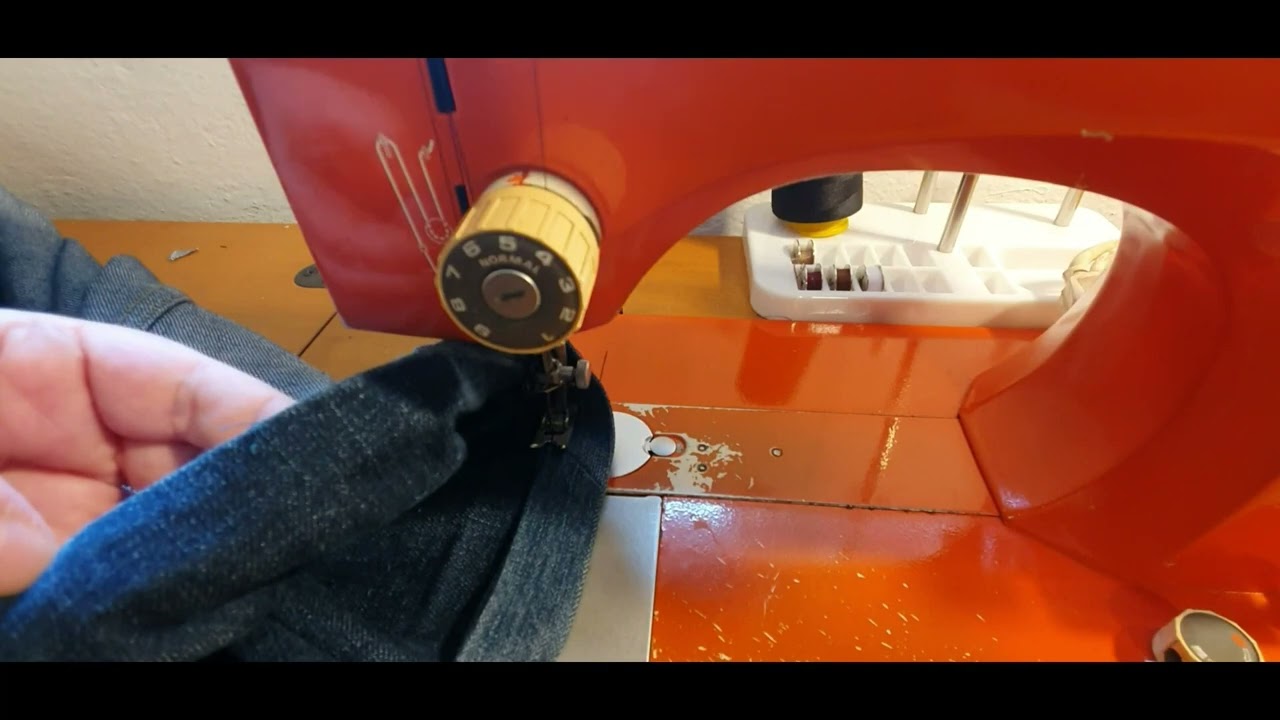 jeans allungati con orlo riportato