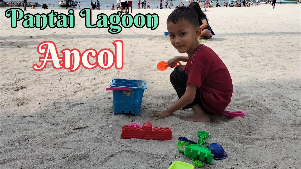 Main pasir dan berenang di pantai Lagoon||liburan ke Ancol jakarta