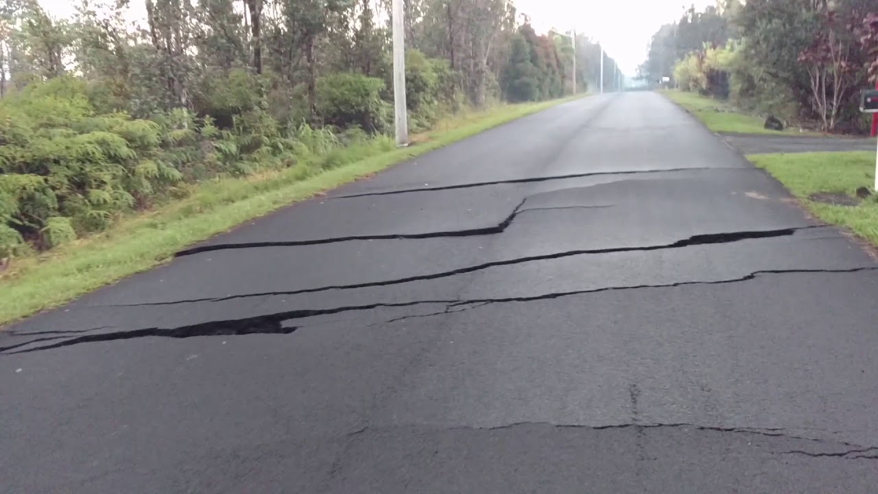 Kilauea volcano eruption road cracks Leilani Estates.  The void on Ho'okupu.  5:37 AM, May 14, 2018