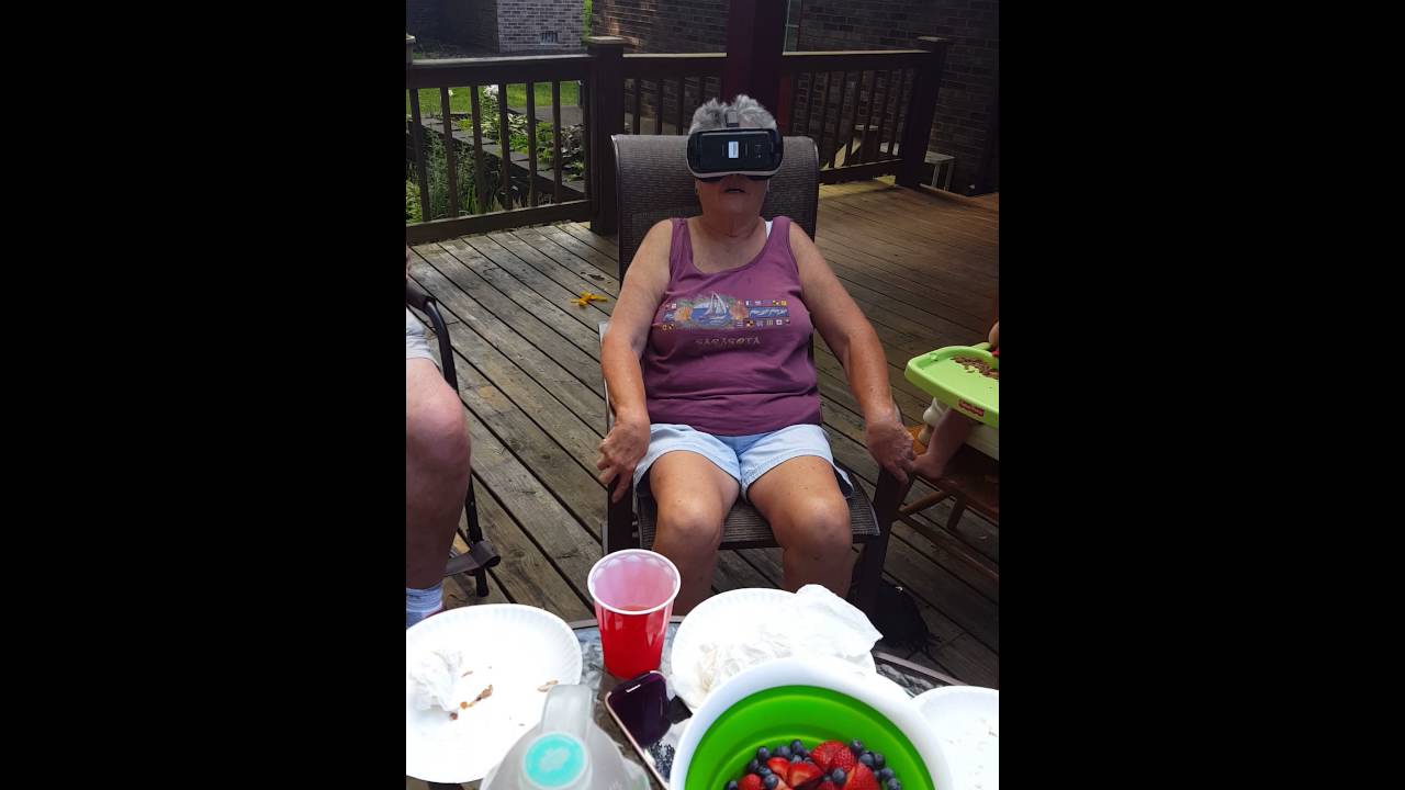 Grandma rides virtual roller coaster with Samsung Oculus