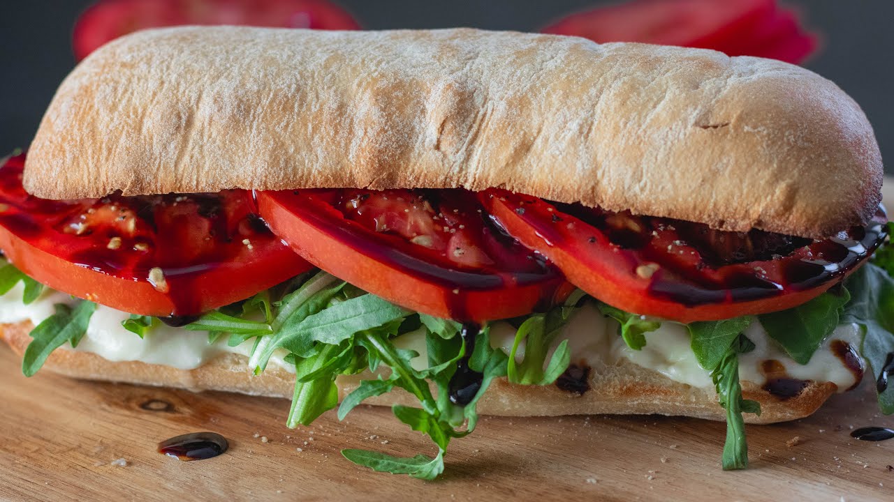 Ciabatta Sandwich with Fresh Mozzarella, Arugula, Tomato, and Balsamic Glaze