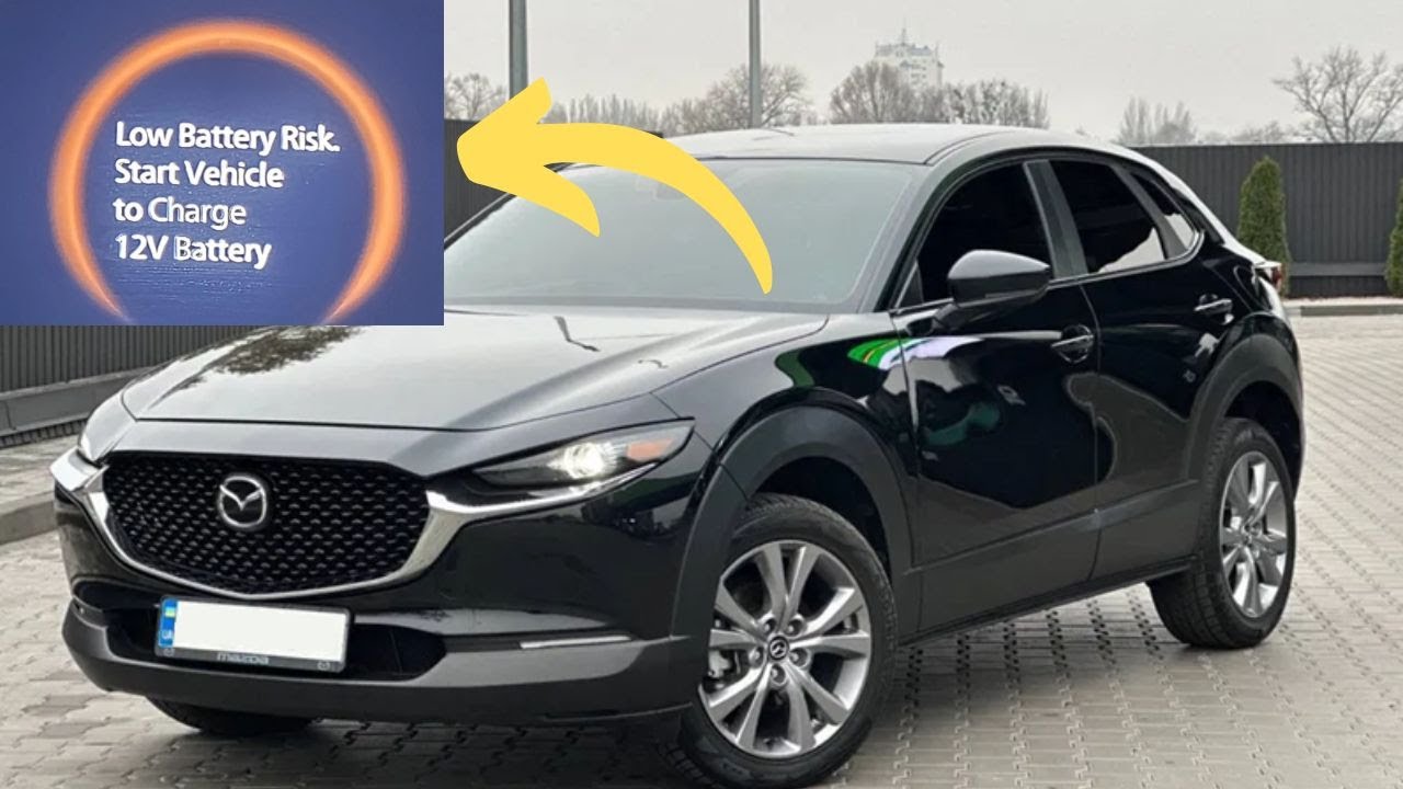 Предупреждение «Риск низкого заряда батареи» в Mazda CX-30