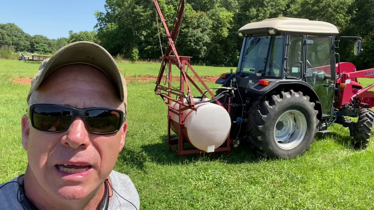 Spraying the pasture with GrazonNext Herbicide