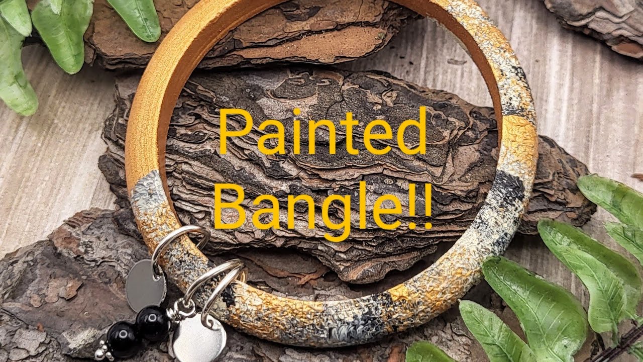 Painted bangle with dangly charms!