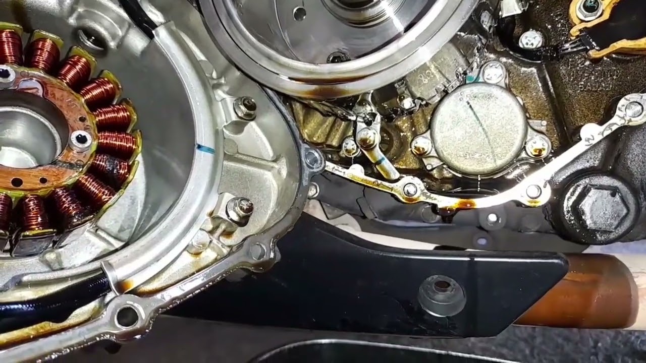 SACAR  ESTATOR A DOMINAR 400CC 