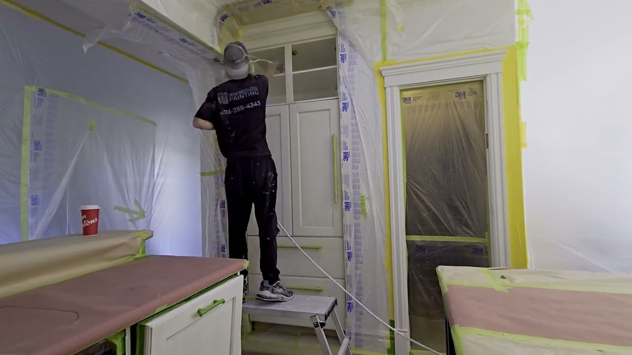 Spraying Primer on Kitchen