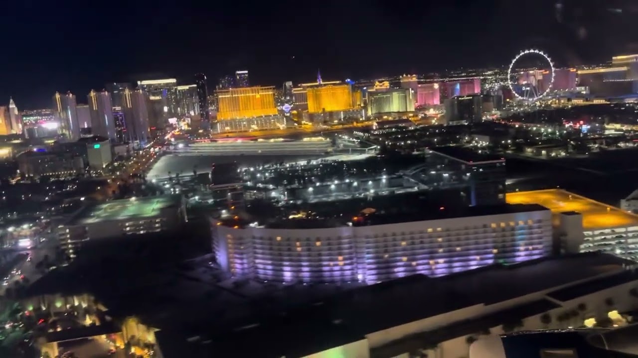 Spectacular night time landing in Las Vegas strip city lights