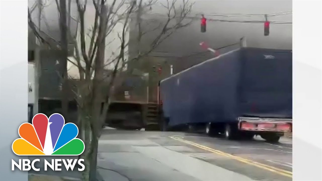 Caught on camera: Freight train slams into tractor-trailer in upstate New York