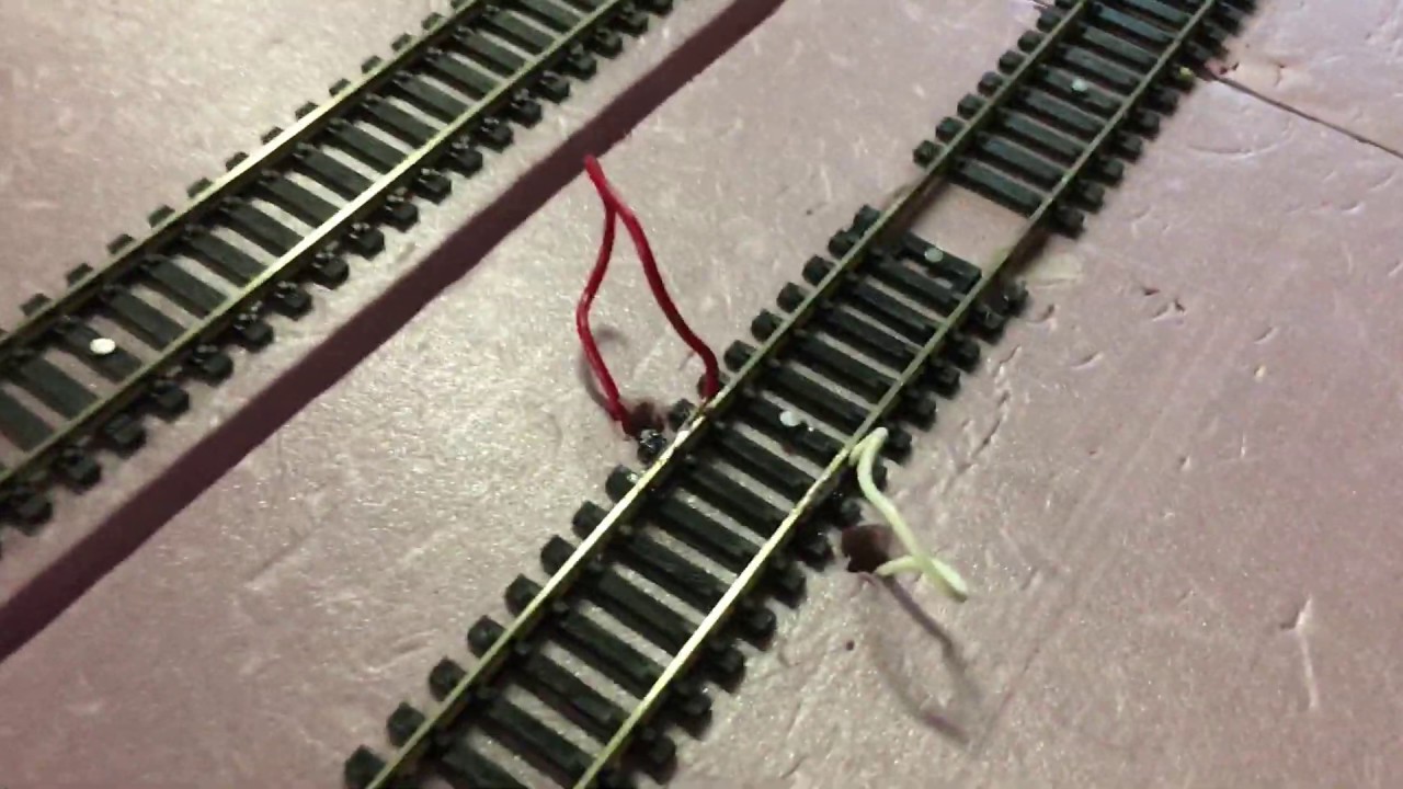 Installing Track Feeder Wires. Why We Do It.