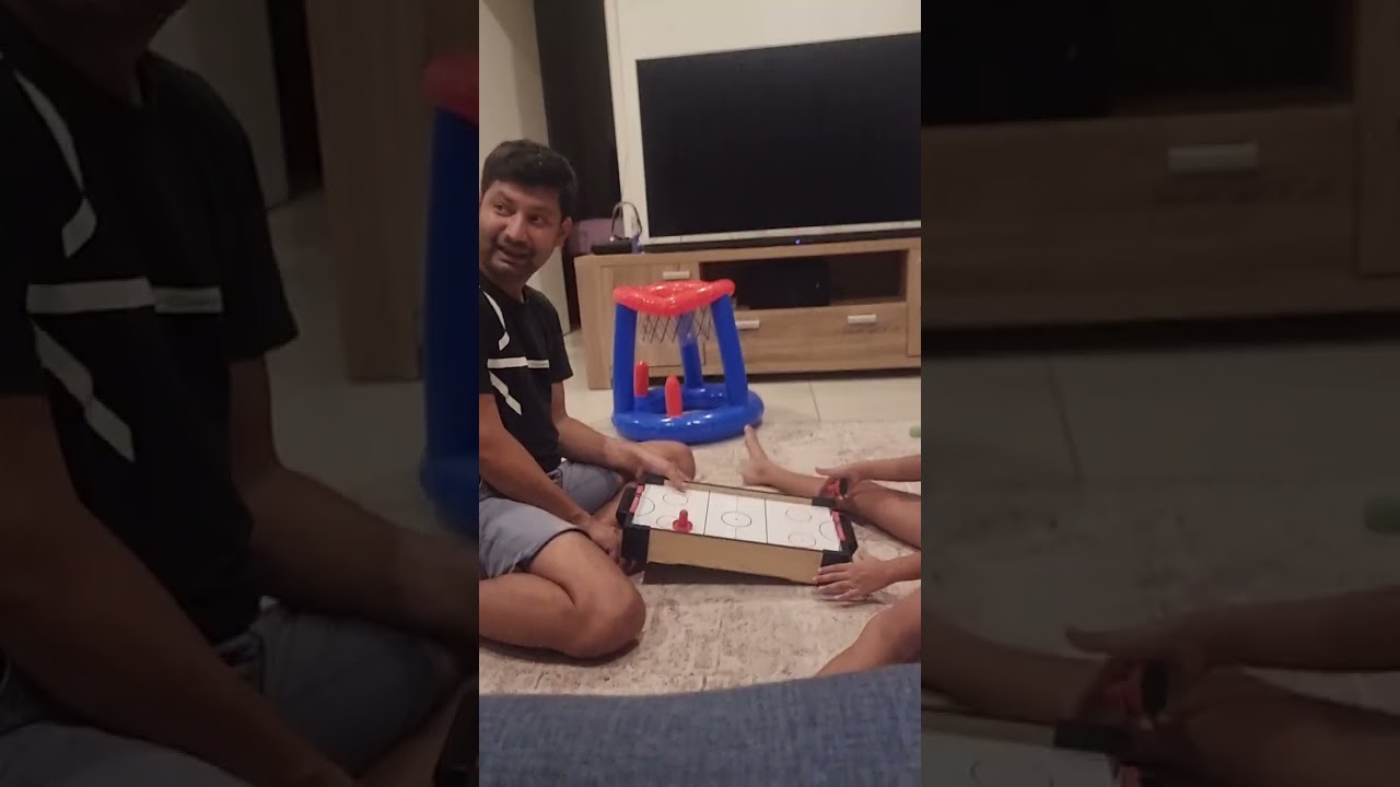 My sister vs my dad in air hockey 